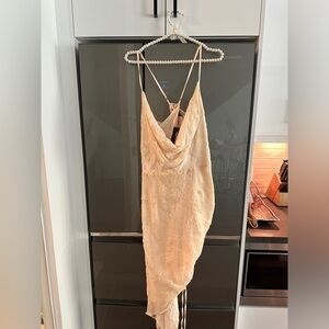 ASYMETREICAL CHAMPAGNE DRESS WITH FLORAL DETAILING AND CORSET BACK